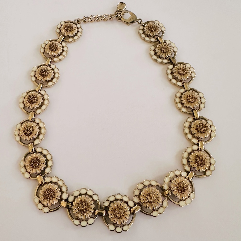 A beautiful flower necklace with intricate design.